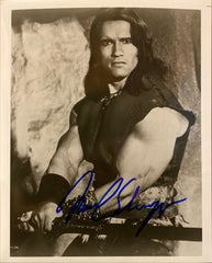 Arnold Schwarzenegger signed "Conan the Barbarian" movie photo