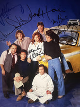 Taxi cast signed photo