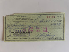 Gig Young signed check