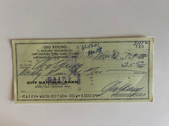 Gig Young signed check