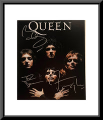 Queen band signed photo