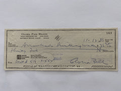 Gloria Pall signed check
