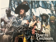 Pirates of the Caribbean: The Curse of the Black Pearl Geoffrey Rush and Isaac C. Singleton Jr. signed lobby card
. GFA Authenticated