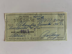 Gig Young signed check