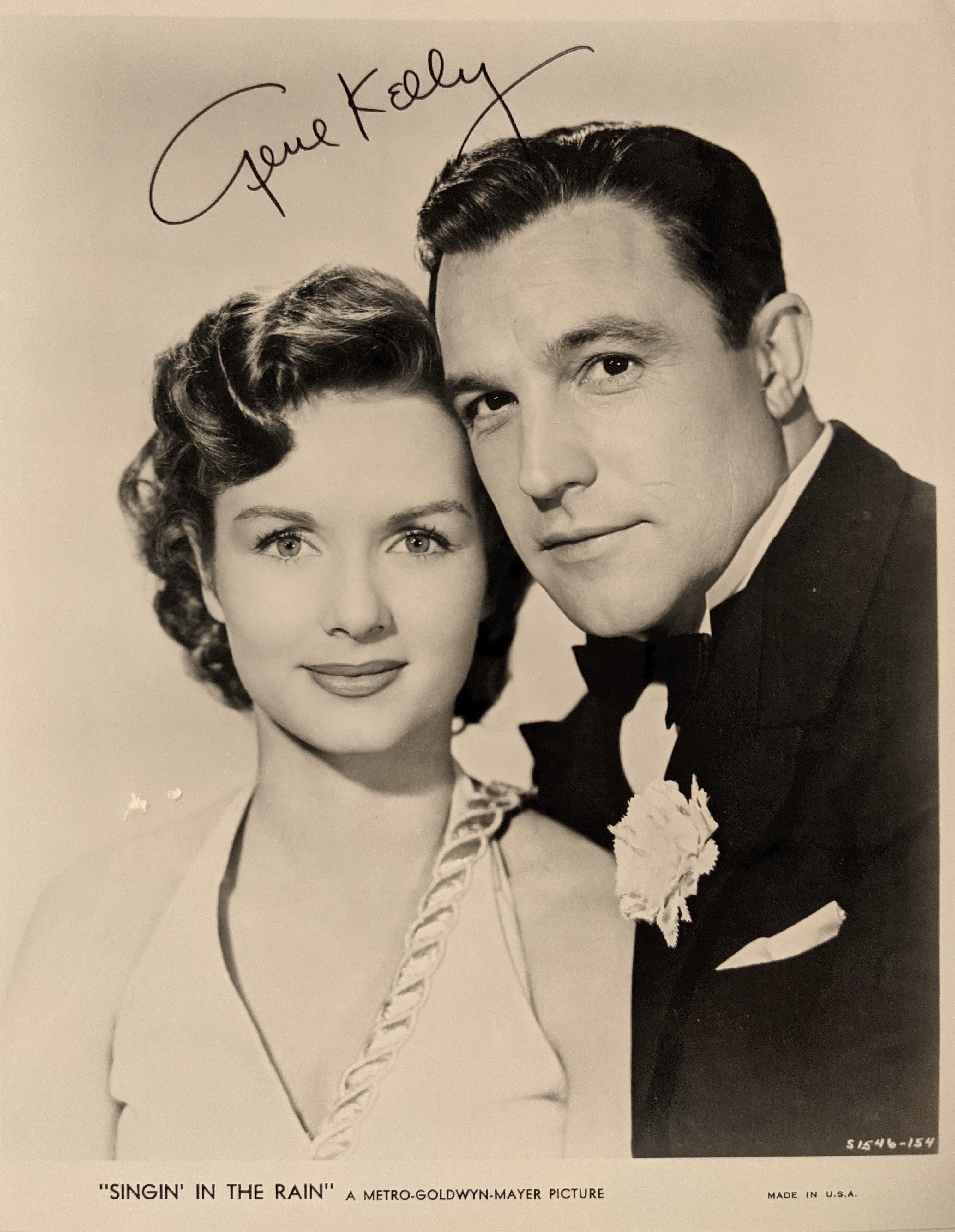 Gene Kelly signed Singing in The Rain photo