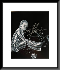 Elton John signed photo