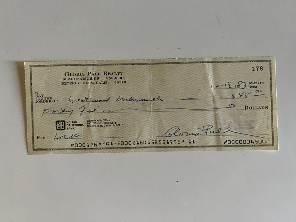 Gloria Pall signed check