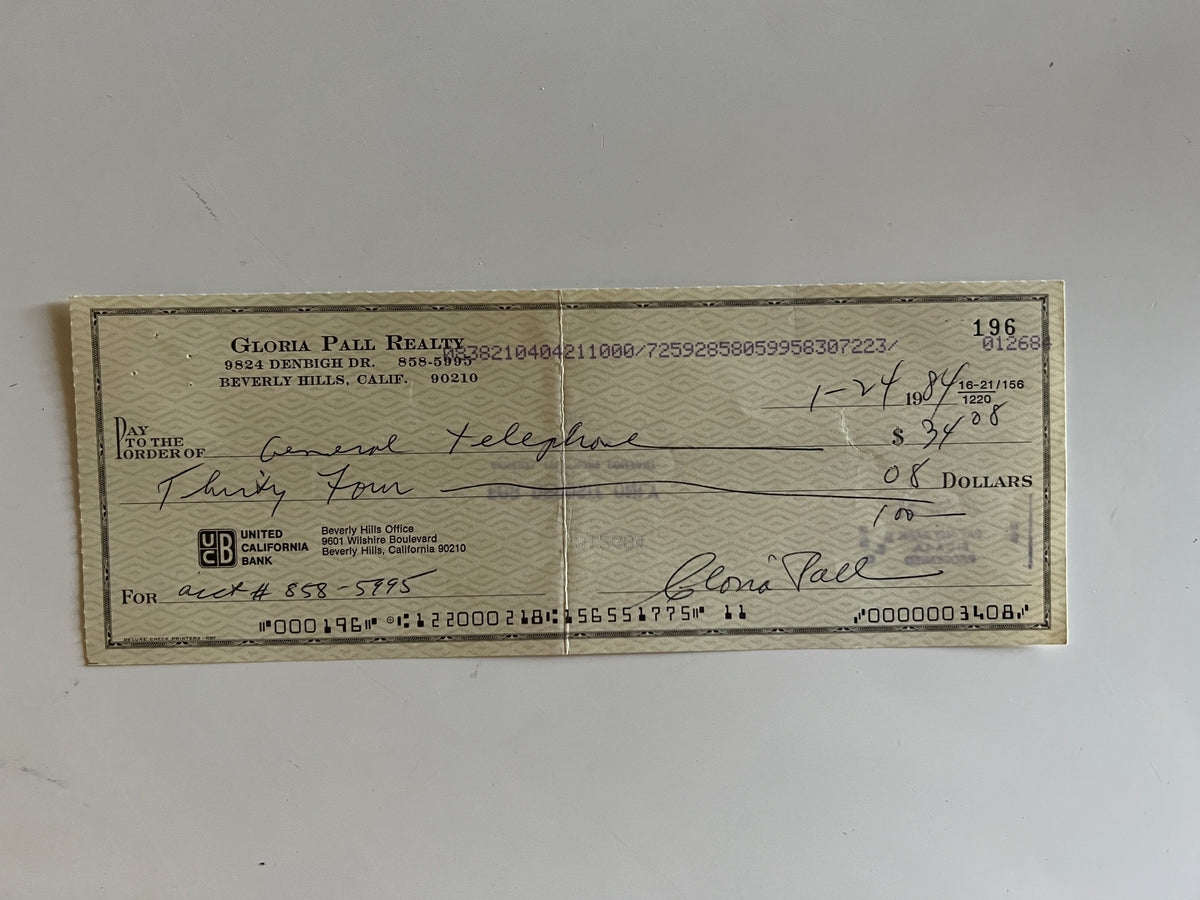 Gloria Pall signed check