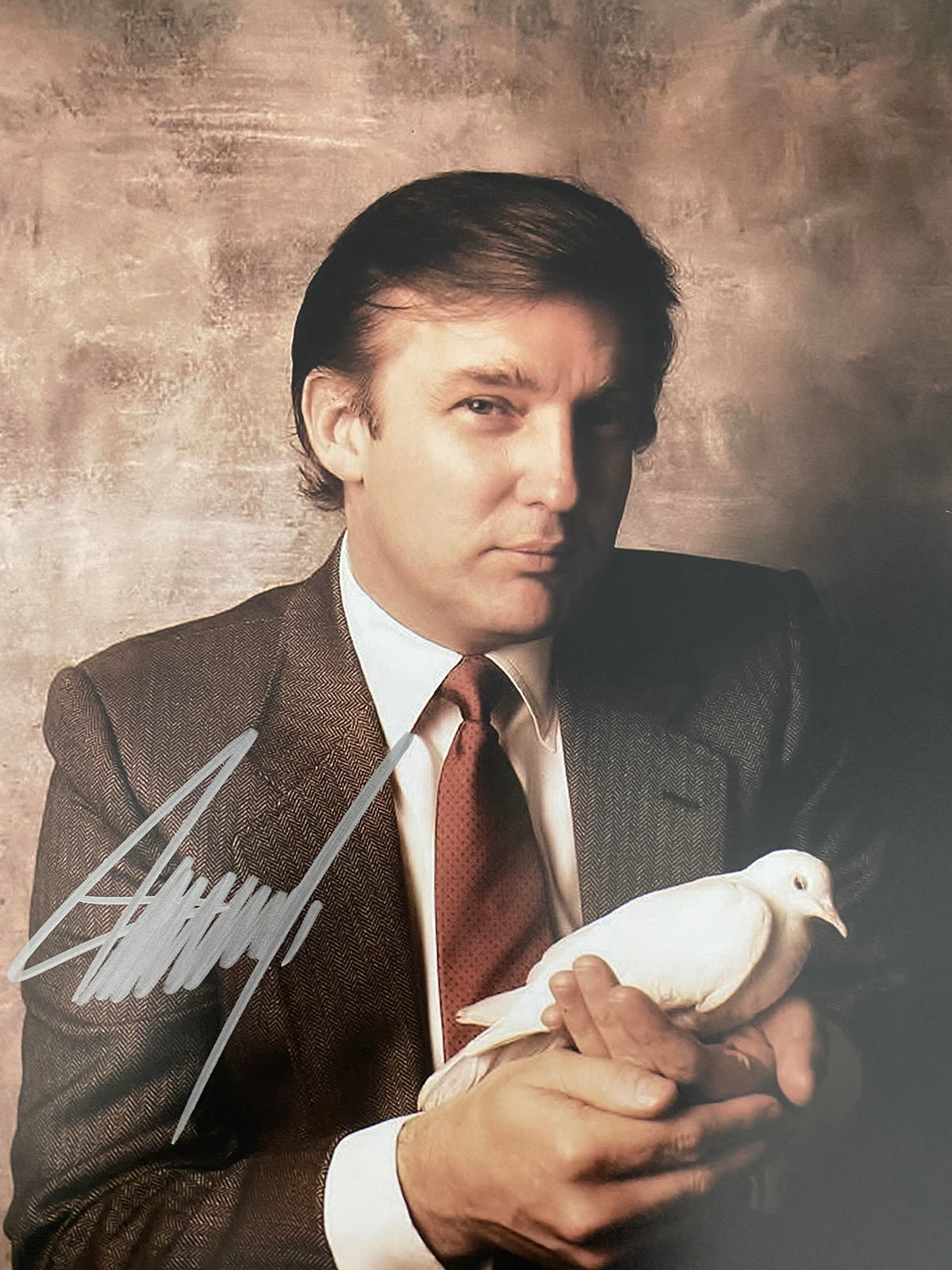 Donald Trump with a dove signed photo