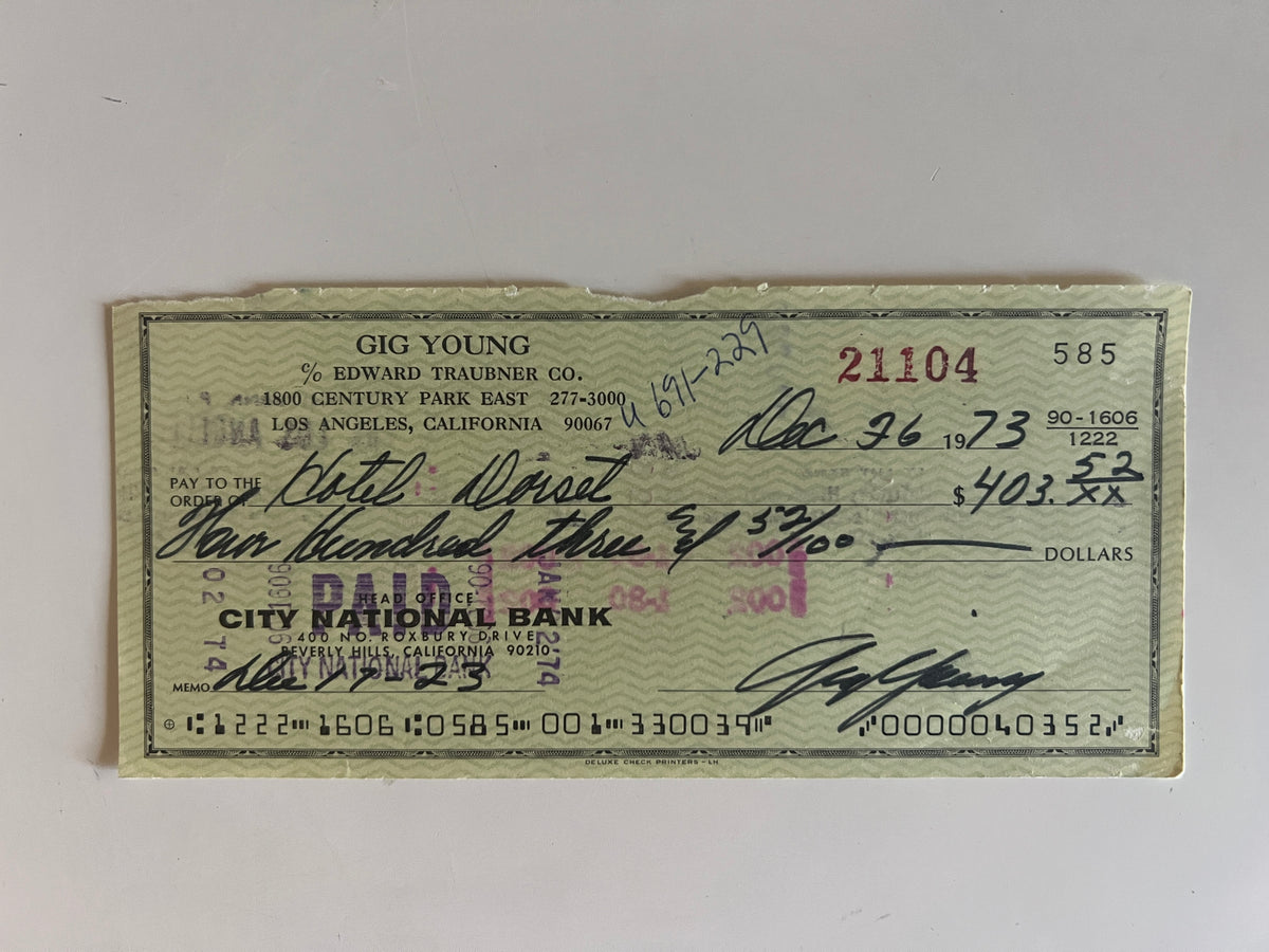 Gig Young signed check