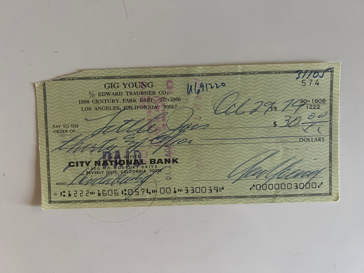Gig Young signed check
