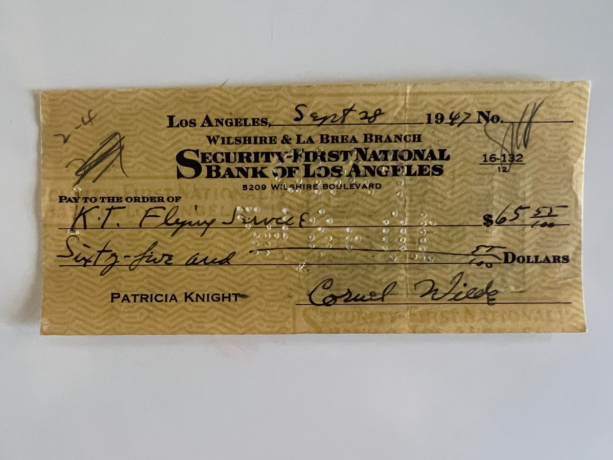 Cornel Wilde signed check