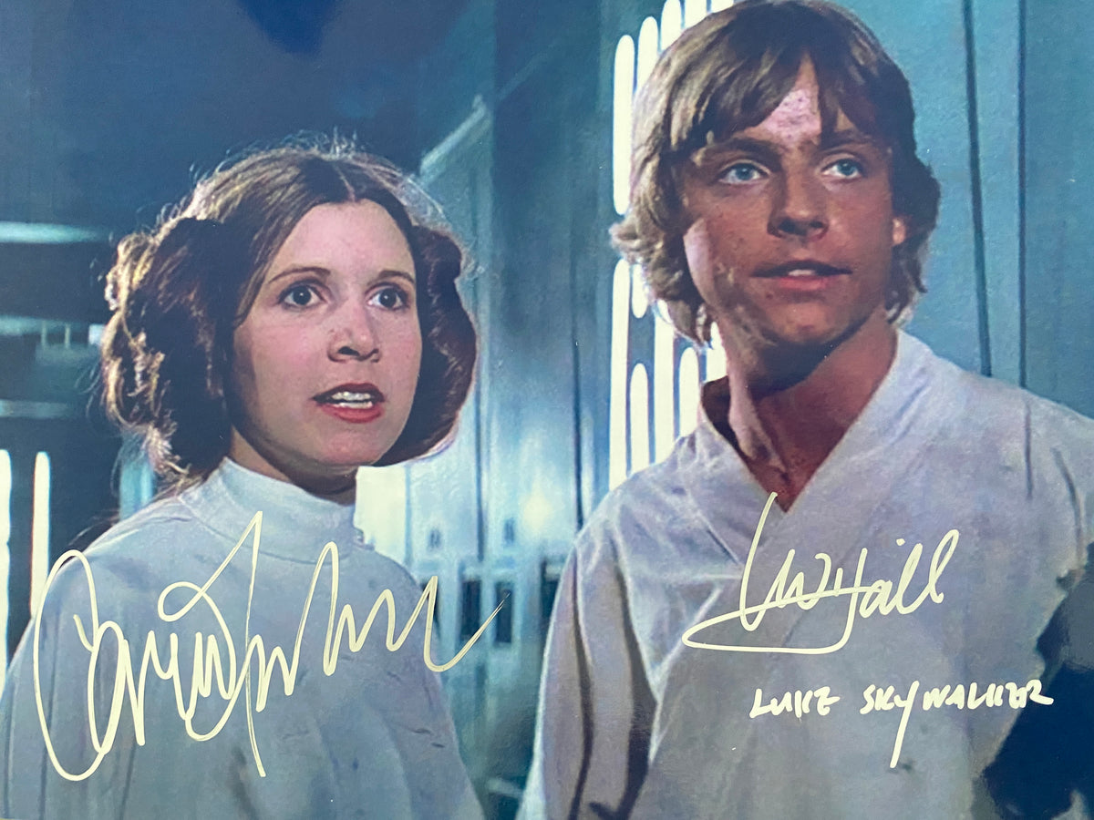 Star Wars Carrie Fisher and Mark Hamill signed movie photo. GFA Authenticated