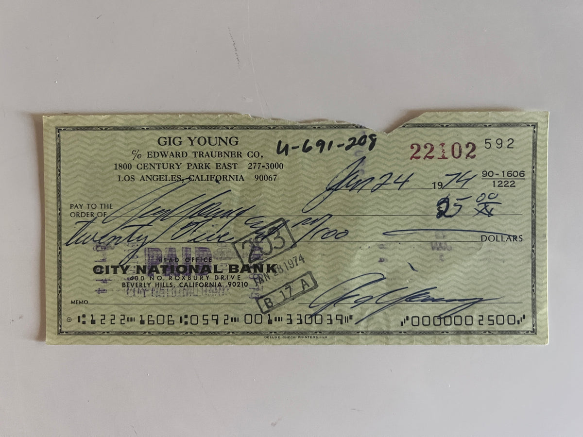 Gig Young signed check