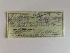 Gig Young signed check