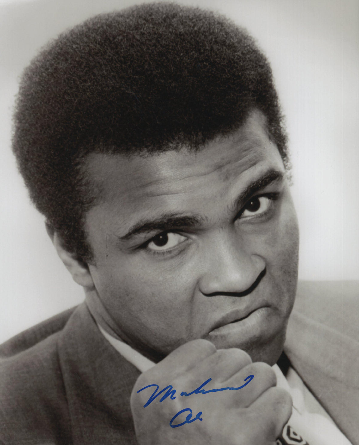 Muhammad Ali signed photo. GFA Authenticated