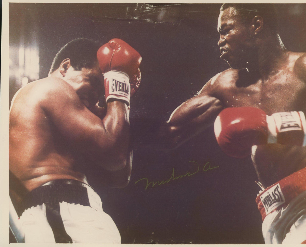 Muhammad Ali signed photo. GFA Authenticated
