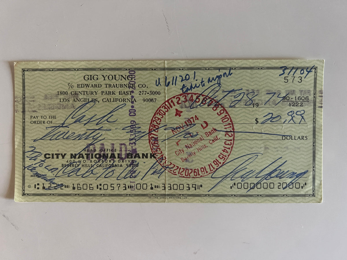 Gig Young signed check