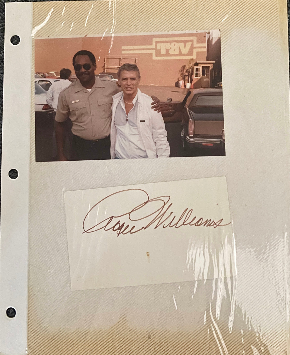 Roger Williams photo album page with original signature