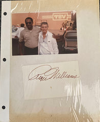 Roger Williams photo album page with original signature