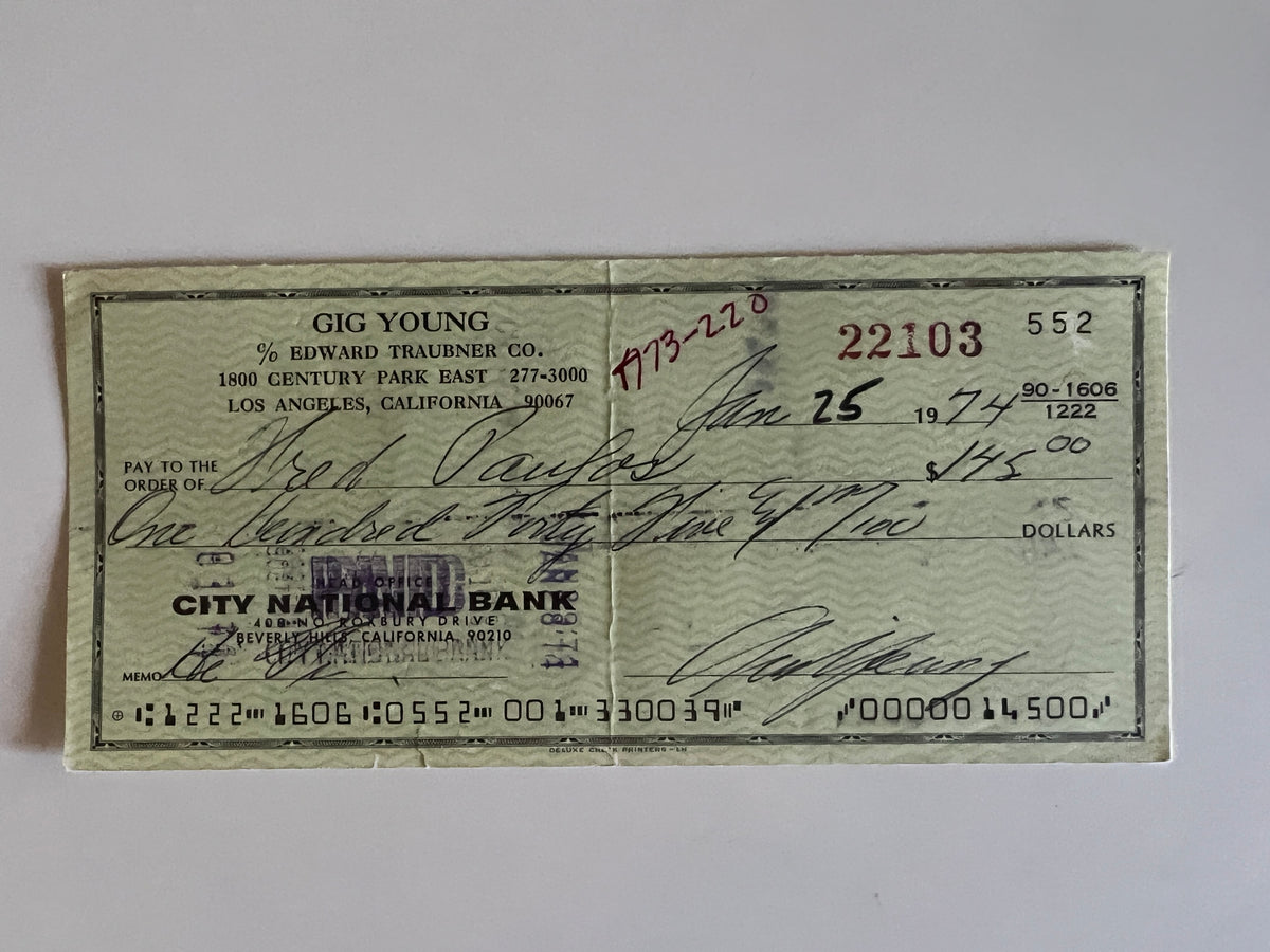 Gig Young signed check