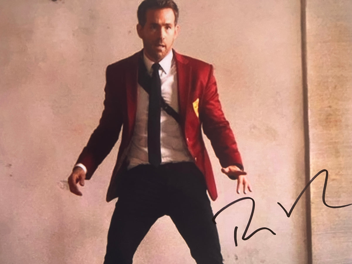 Red Notice Ryan Reynolds signed photo. GFA Authenticated