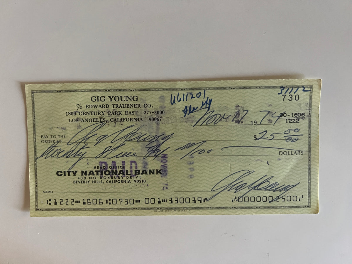 Gig Young signed check