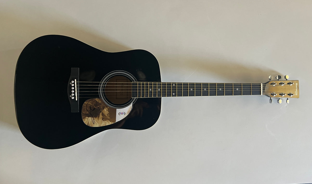 Taylor Swift signed acoustic guitar.  PSA DNA authenticated