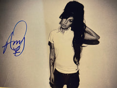 Amy Winehouse signed photo. 8x10 inches. GFA authenticated
