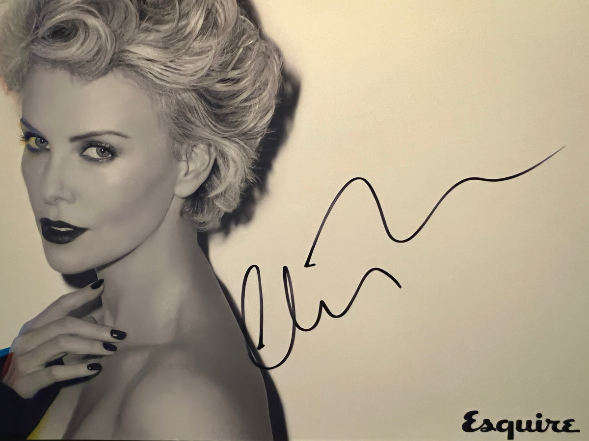 Charlize Theron signed photo