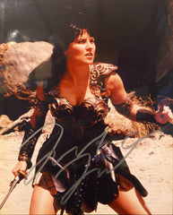 Lucy Lawless signed "Xena: Warrior Princess" photo
