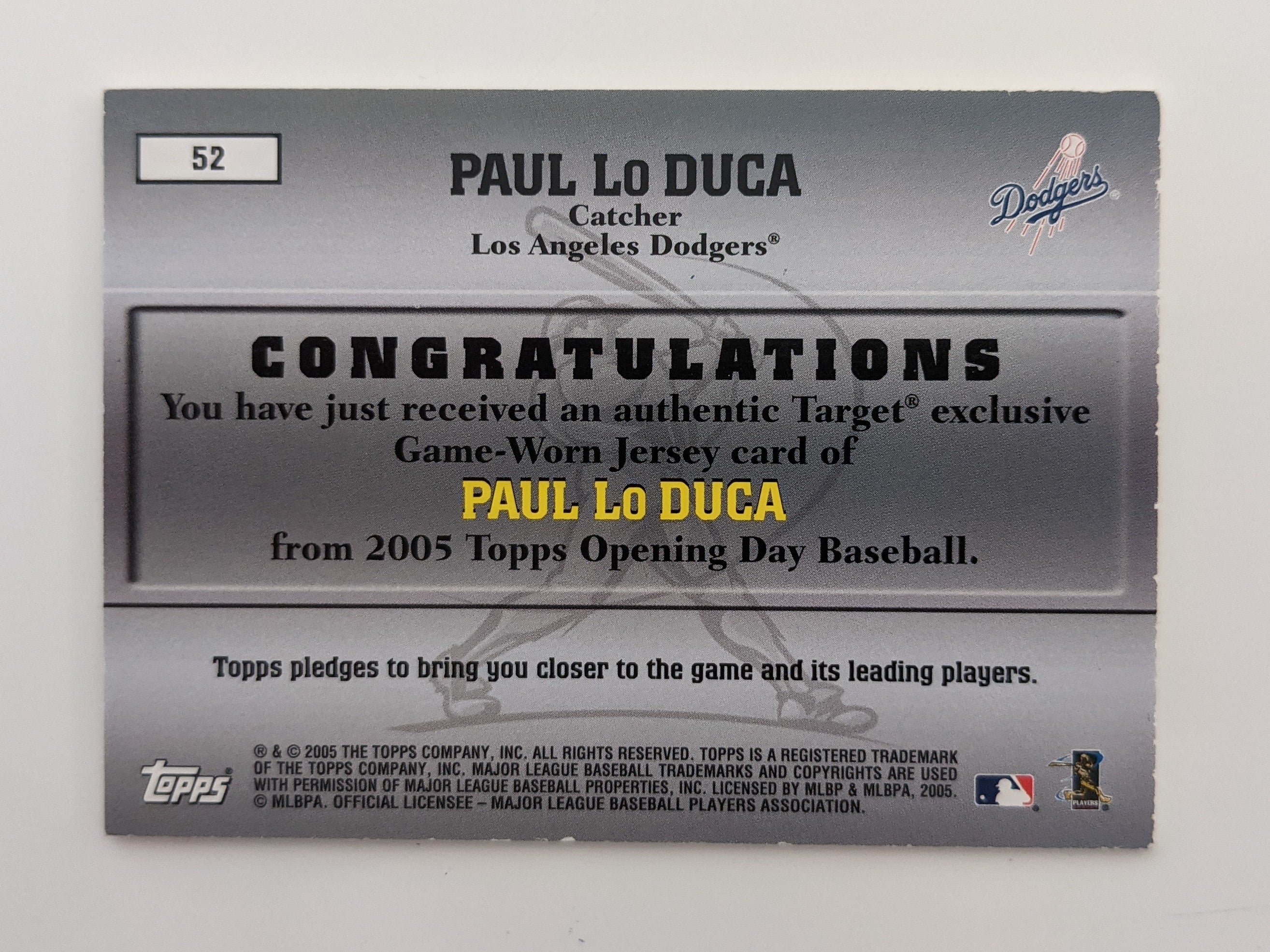 Paul Lo Duca Baseball Trading Card with Game Used Jersey Swatch - Topps Game Worn Jersey Collection #52 2005