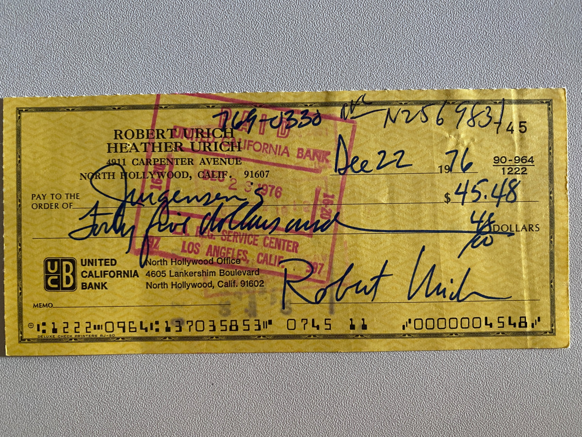 Robert Urich signed check