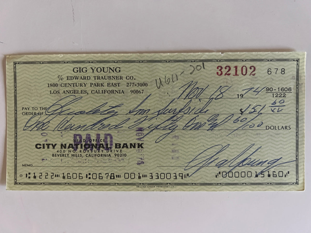 Gig Young signed check