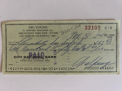 Gig Young signed check