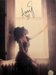 Amy Winehouse signed photo. GFA authenticated