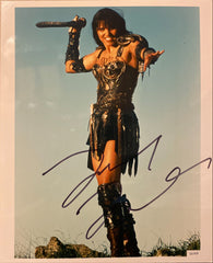 Lucy Lawless signed "Xena: Warrior Princess" photo