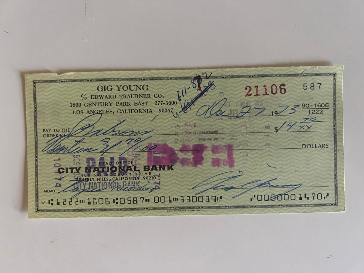 Gig Young signed check