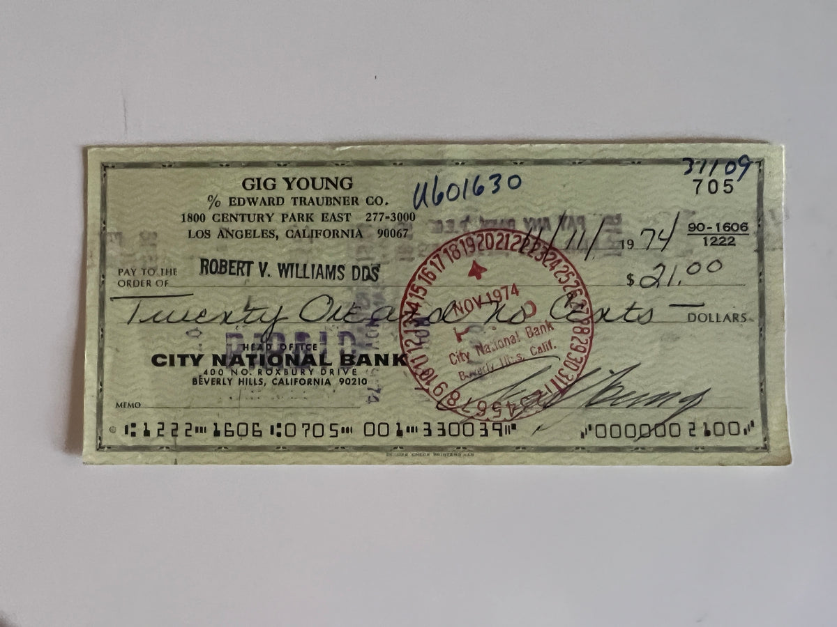 Gig Young signed check