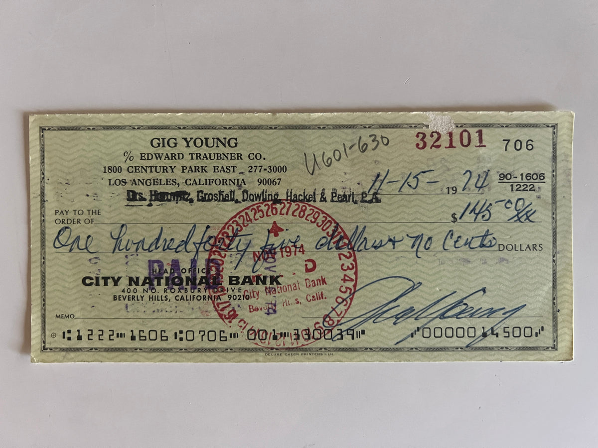 Gig Young signed check
