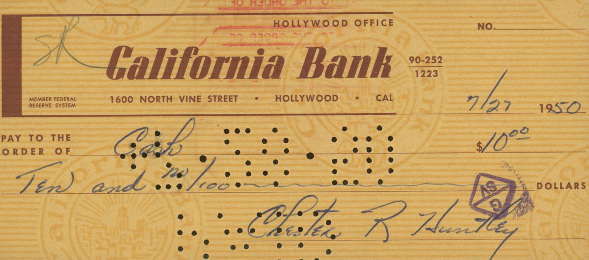Evening News Anchor Chester Huntley signed check