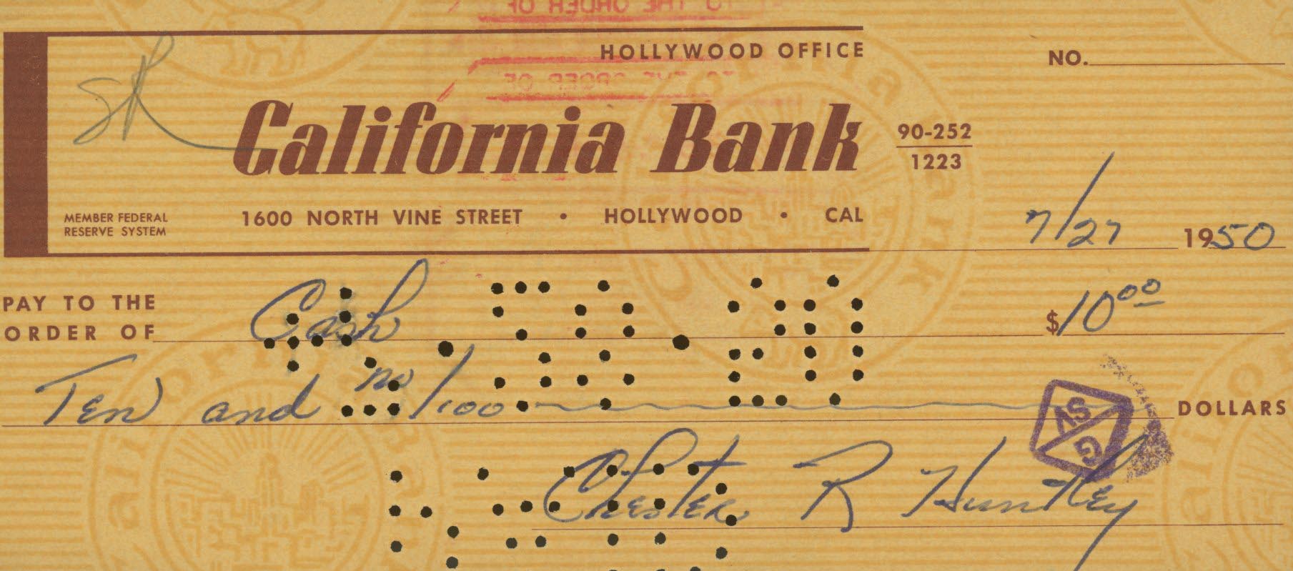 Evening News Anchor Chester Huntley signed check