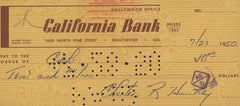 Evening News Anchor Chester Huntley signed check