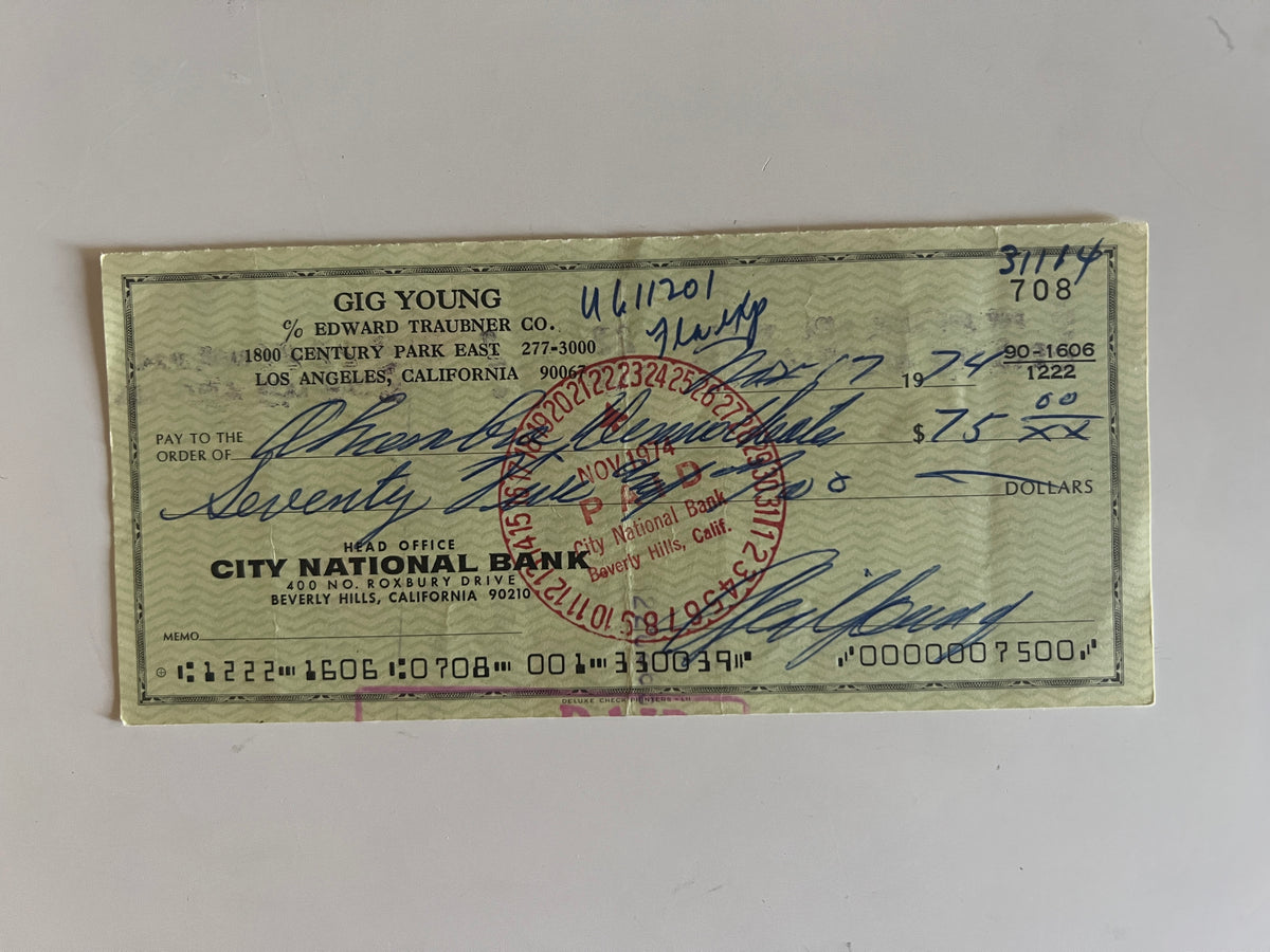 Gig Young signed check