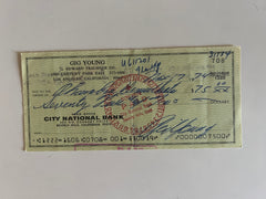 Gig Young signed check